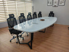 İstanbul Ofis Mobilya modern beyaz oval toplantı masası, siyah metal ayaklı ve kablo kanallı geniş ofis masası.